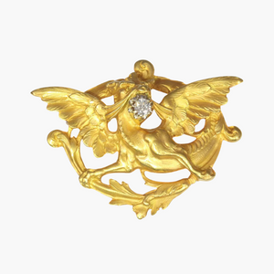 Broche or